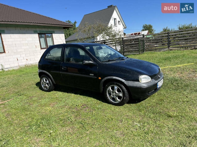 Черный Опель Корса, объемом двигателя 1.2 л и пробегом 400 тыс. км за 2400 $, фото 2 на Automoto.ua
