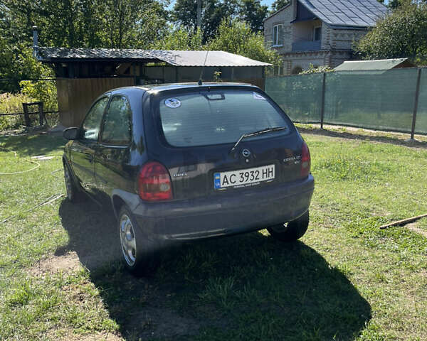 Черный Опель Корса, объемом двигателя 1.2 л и пробегом 400 тыс. км за 2400 $, фото 1 на Automoto.ua