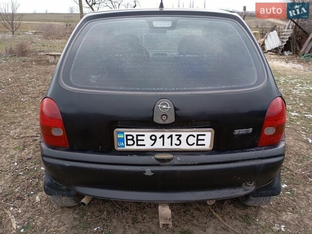 Чорний Опель Корса, об'ємом двигуна 1.2 л та пробігом 377 тис. км за 560 $, фото 2 на Automoto.ua