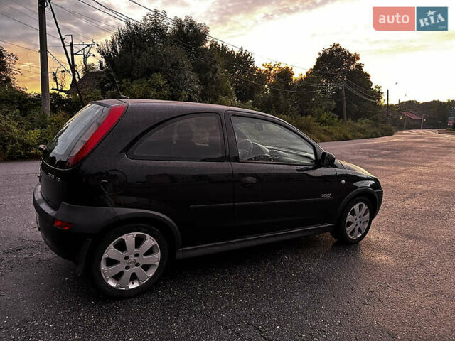Чорний Опель Корса, об'ємом двигуна 1.23 л та пробігом 328 тис. км за 3100 $, фото 3 на Automoto.ua