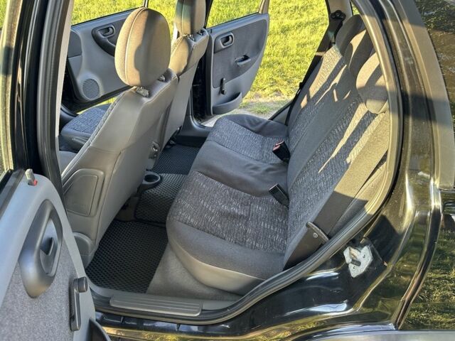 Черный Опель Корса, объемом двигателя 1.7 л и пробегом 340 тыс. км за 3000 $, фото 15 на Automoto.ua