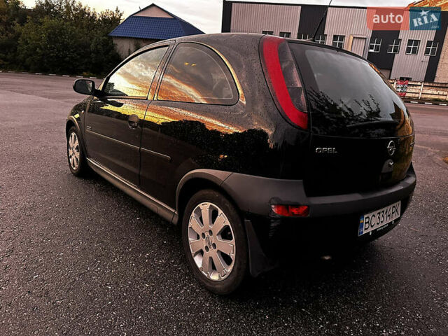 Чорний Опель Корса, об'ємом двигуна 1.23 л та пробігом 328 тис. км за 3100 $, фото 4 на Automoto.ua