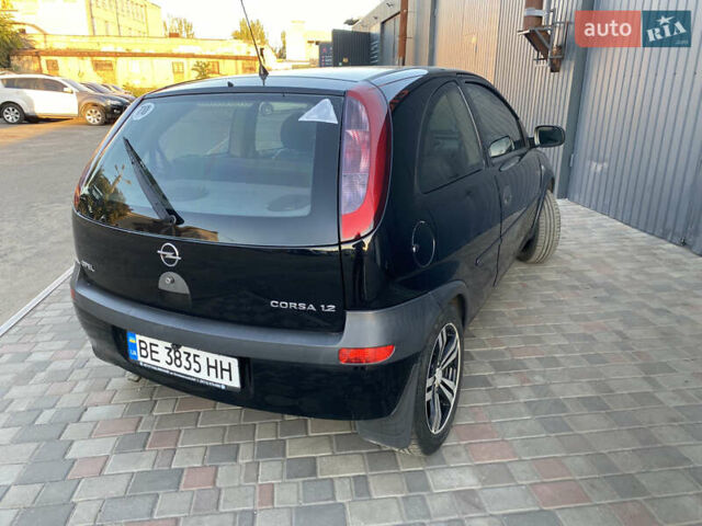 Черный Опель Корса, объемом двигателя 1.2 л и пробегом 288 тыс. км за 3600 $, фото 4 на Automoto.ua