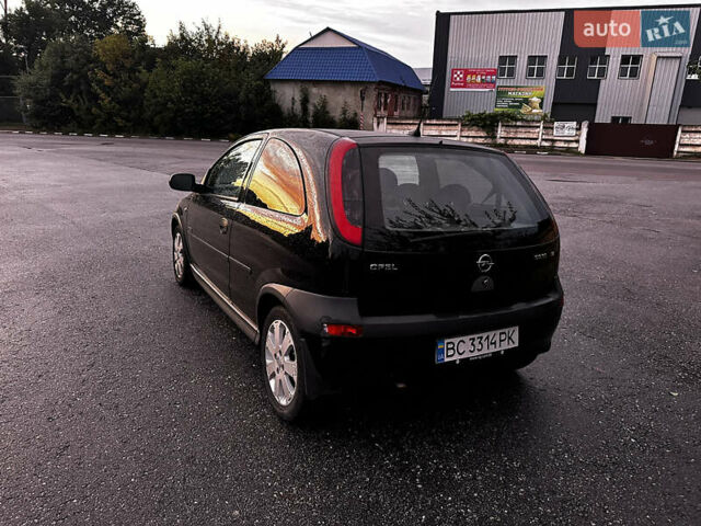 Чорний Опель Корса, об'ємом двигуна 1.23 л та пробігом 328 тис. км за 3100 $, фото 5 на Automoto.ua