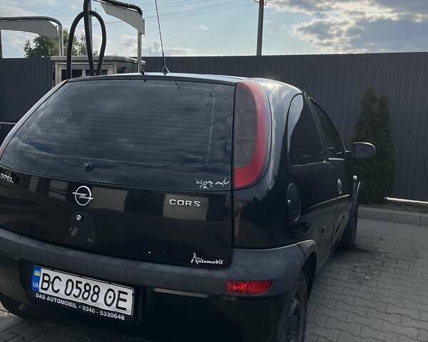 Черный Опель Корса, объемом двигателя 0.97 л и пробегом 290 тыс. км за 2600 $, фото 3 на Automoto.ua