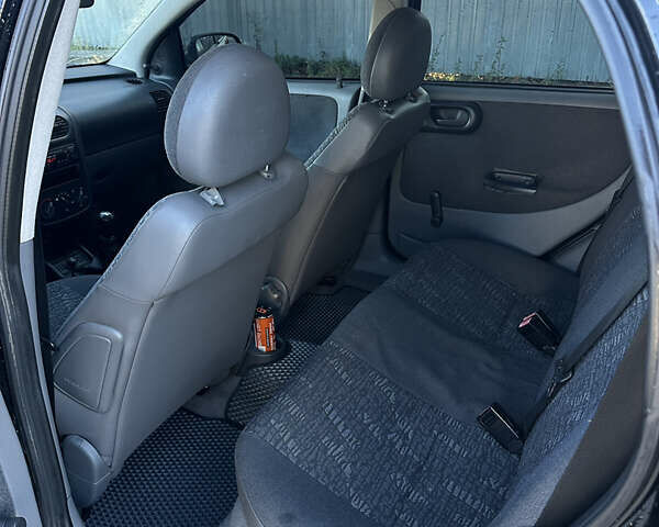 Чорний Опель Корса, об'ємом двигуна 1.69 л та пробігом 300 тис. км за 2900 $, фото 6 на Automoto.ua