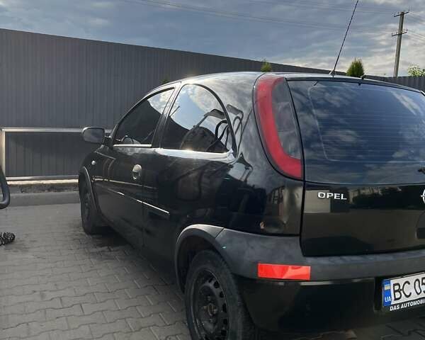 Черный Опель Корса, объемом двигателя 0.97 л и пробегом 290 тыс. км за 2600 $, фото 4 на Automoto.ua