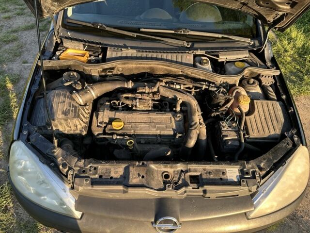 Черный Опель Корса, объемом двигателя 1.7 л и пробегом 340 тыс. км за 3000 $, фото 19 на Automoto.ua