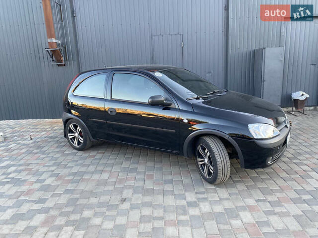 Черный Опель Корса, объемом двигателя 1.2 л и пробегом 288 тыс. км за 3600 $, фото 2 на Automoto.ua