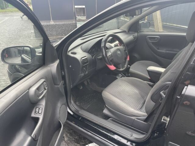 Черный Опель Корса, объемом двигателя 1 л и пробегом 250 тыс. км за 2650 $, фото 4 на Automoto.ua