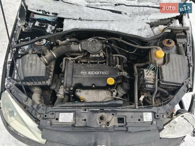 Чорний Опель Корса, об'ємом двигуна 1.2 л та пробігом 176 тис. км за 1200 $, фото 16 на Automoto.ua