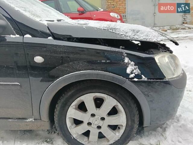 Чорний Опель Корса, об'ємом двигуна 1.2 л та пробігом 176 тис. км за 1200 $, фото 38 на Automoto.ua