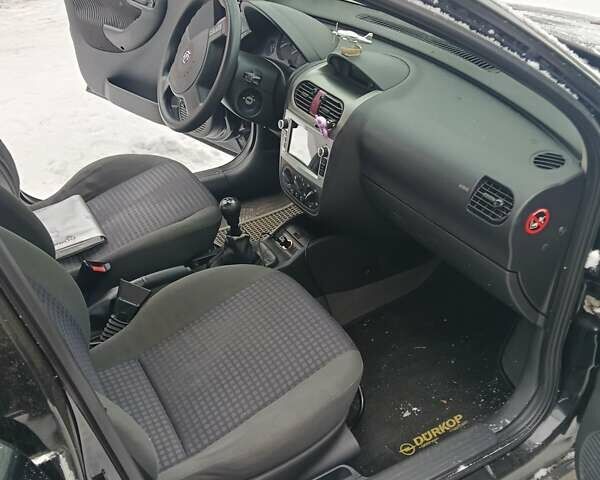 Чорний Опель Корса, об'ємом двигуна 1.2 л та пробігом 176 тис. км за 1200 $, фото 6 на Automoto.ua