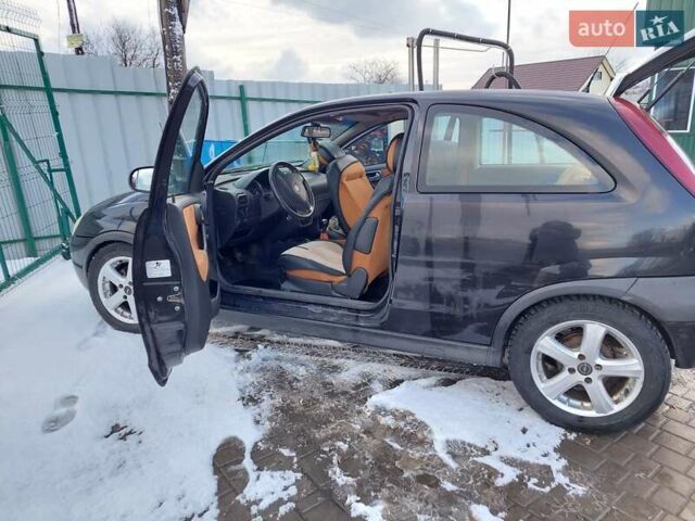 Черный Опель Корса, объемом двигателя 1.2 л и пробегом 140 тыс. км за 3200 $, фото 8 на Automoto.ua