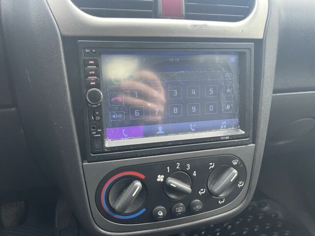 Черный Опель Корса, объемом двигателя 1 л и пробегом 250 тыс. км за 2650 $, фото 5 на Automoto.ua