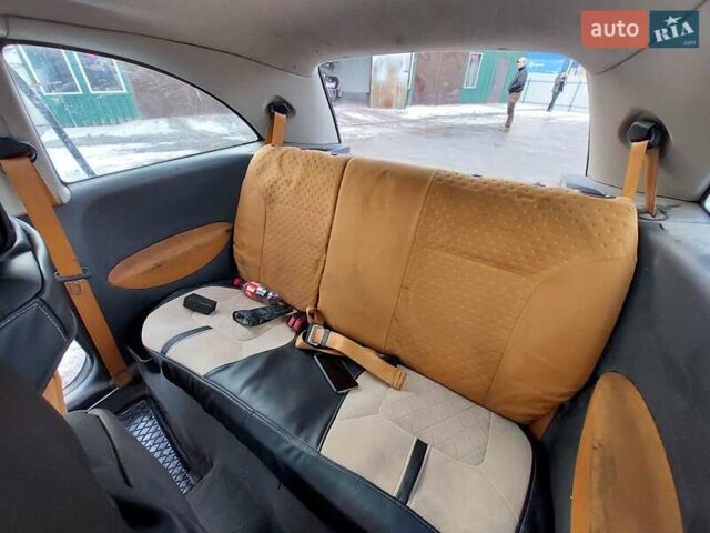 Черный Опель Корса, объемом двигателя 1.2 л и пробегом 140 тыс. км за 3200 $, фото 11 на Automoto.ua