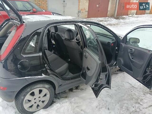 Чорний Опель Корса, об'ємом двигуна 1.2 л та пробігом 176 тис. км за 1200 $, фото 5 на Automoto.ua