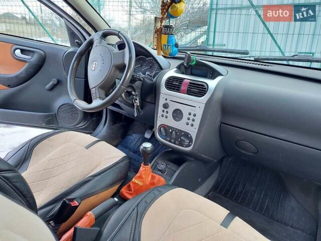 Черный Опель Корса, объемом двигателя 1.2 л и пробегом 140 тыс. км за 3200 $, фото 3 на Automoto.ua