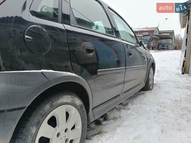 Чорний Опель Корса, об'ємом двигуна 1.2 л та пробігом 176 тис. км за 1200 $, фото 28 на Automoto.ua