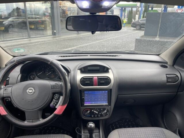 Черный Опель Корса, объемом двигателя 1 л и пробегом 250 тыс. км за 2650 $, фото 6 на Automoto.ua