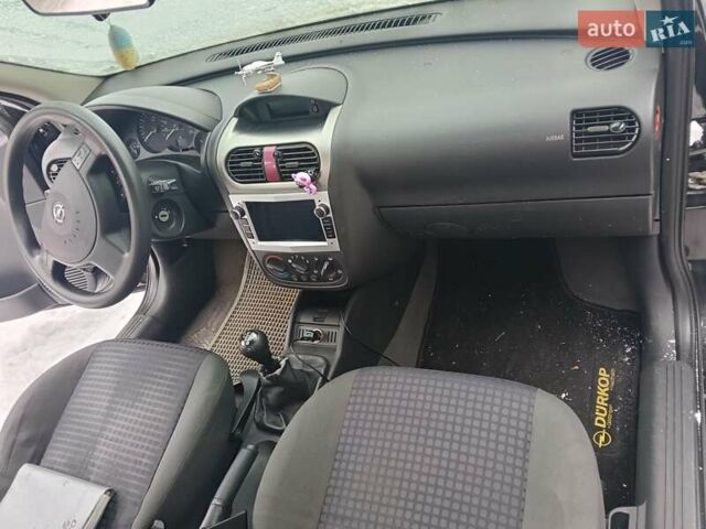 Чорний Опель Корса, об'ємом двигуна 1.2 л та пробігом 176 тис. км за 1200 $, фото 7 на Automoto.ua