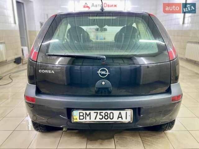 Черный Опель Корса, объемом двигателя 0.97 л и пробегом 260 тыс. км за 2999 $, фото 11 на Automoto.ua