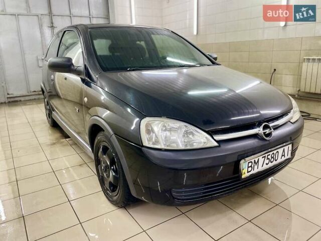 Черный Опель Корса, объемом двигателя 0.97 л и пробегом 260 тыс. км за 2999 $, фото 5 на Automoto.ua