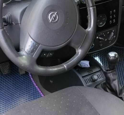 Чорний Опель Корса, об'ємом двигуна 1 л та пробігом 215 тис. км за 2900 $, фото 4 на Automoto.ua