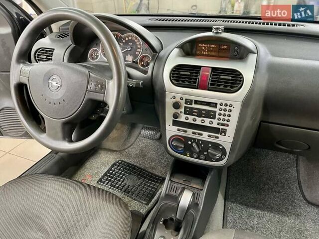 Черный Опель Корса, объемом двигателя 0.97 л и пробегом 260 тыс. км за 2999 $, фото 26 на Automoto.ua