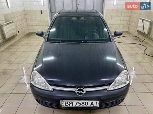 Черный Опель Корса, объемом двигателя 0.97 л и пробегом 260 тыс. км за 2999 $, фото 4 на Automoto.ua