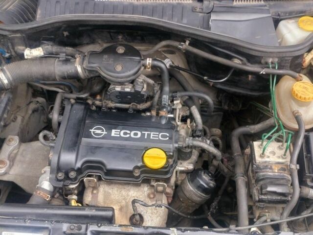 Черный Опель Корса, объемом двигателя 1 л и пробегом 215 тыс. км за 2300 $, фото 4 на Automoto.ua