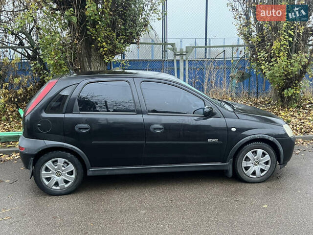 Черный Опель Корса, объемом двигателя 1.39 л и пробегом 280 тыс. км за 2200 $, фото 2 на Automoto.ua