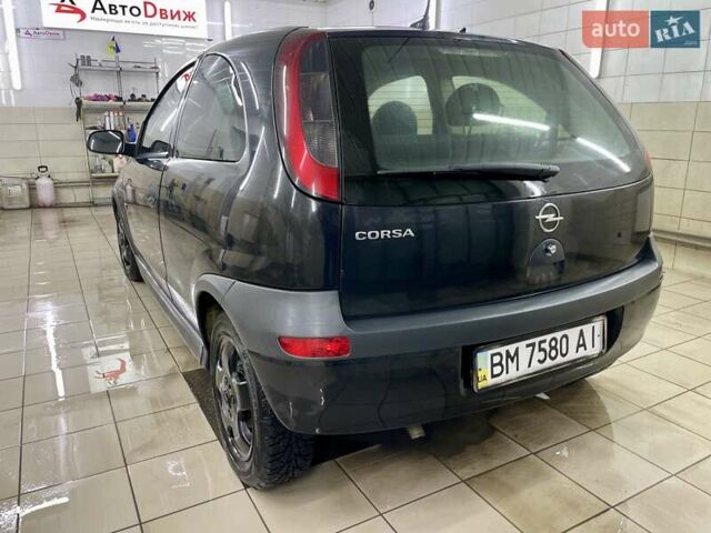Черный Опель Корса, объемом двигателя 0.97 л и пробегом 260 тыс. км за 2999 $, фото 14 на Automoto.ua
