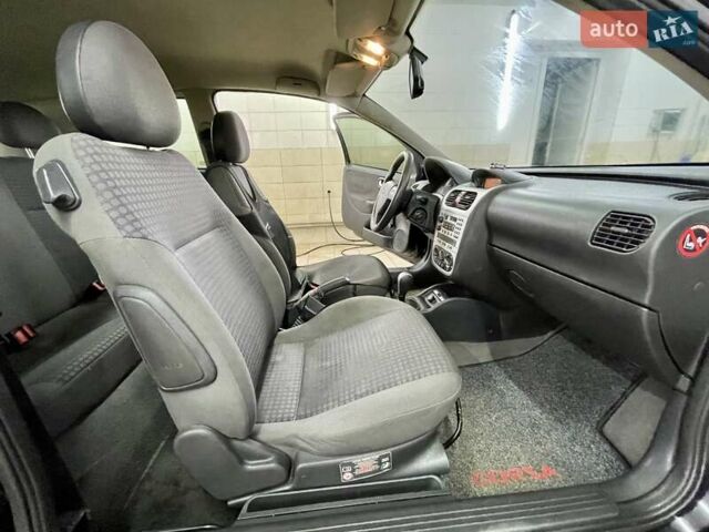 Черный Опель Корса, объемом двигателя 0.97 л и пробегом 260 тыс. км за 2999 $, фото 24 на Automoto.ua