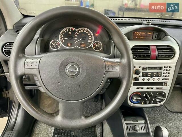 Черный Опель Корса, объемом двигателя 0.97 л и пробегом 260 тыс. км за 2999 $, фото 29 на Automoto.ua