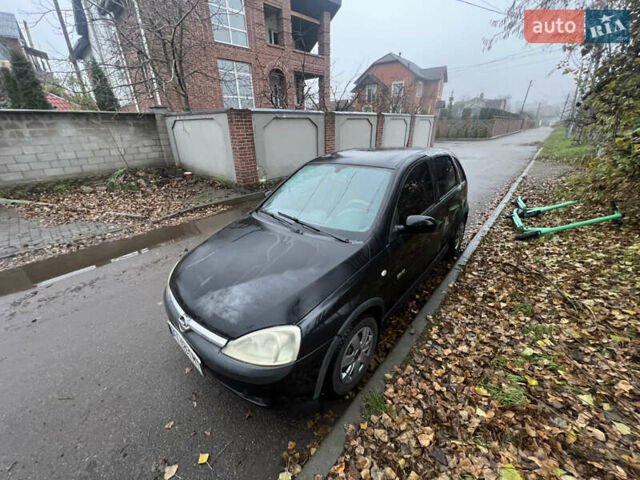 Черный Опель Корса, объемом двигателя 1.39 л и пробегом 280 тыс. км за 2200 $, фото 4 на Automoto.ua