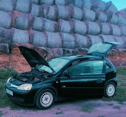 Чорний Опель Корса, об'ємом двигуна 1 л та пробігом 215 тис. км за 2900 $, фото 3 на Automoto.ua