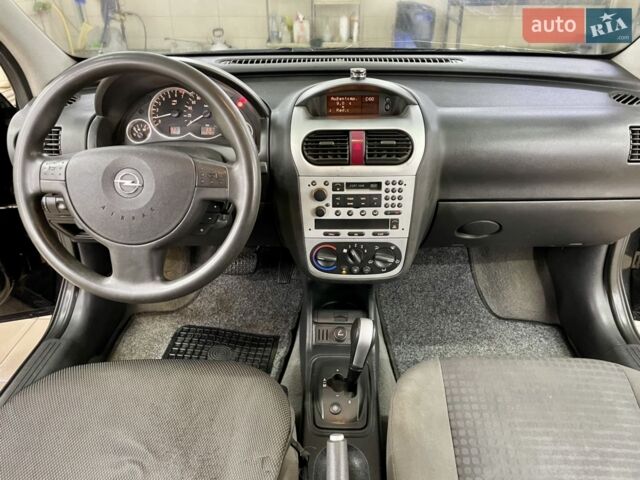 Черный Опель Корса, объемом двигателя 0.97 л и пробегом 260 тыс. км за 2499 $, фото 28 на Automoto.ua