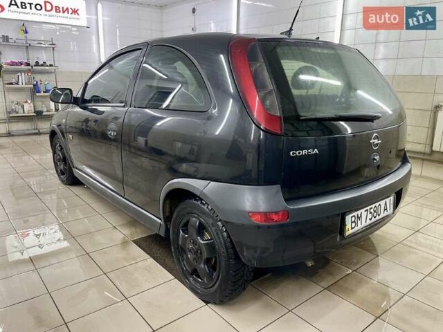 Черный Опель Корса, объемом двигателя 0.97 л и пробегом 260 тыс. км за 2999 $, фото 15 на Automoto.ua