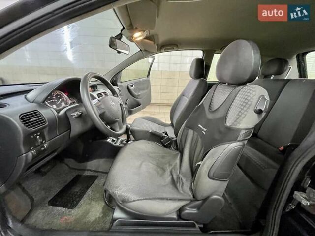 Черный Опель Корса, объемом двигателя 0.97 л и пробегом 260 тыс. км за 2999 $, фото 18 на Automoto.ua