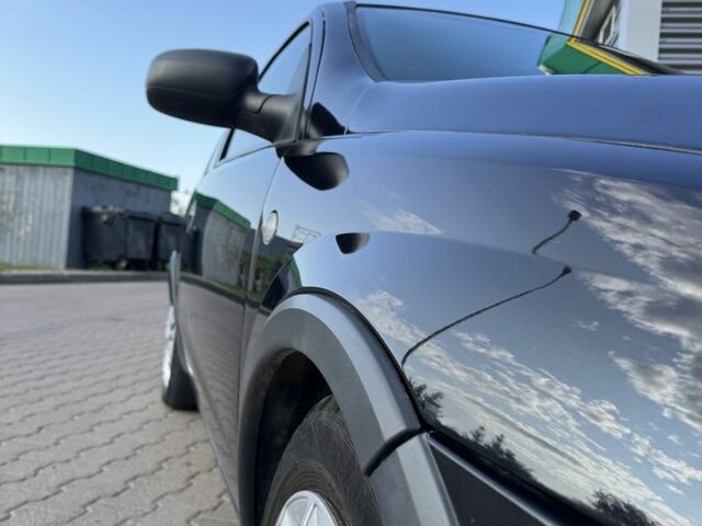 Черный Опель Корса, объемом двигателя 1 л и пробегом 140 тыс. км за 2300 $, фото 5 на Automoto.ua