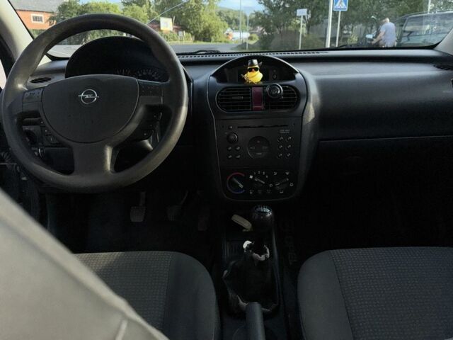 Черный Опель Корса, объемом двигателя 1 л и пробегом 140 тыс. км за 2300 $, фото 6 на Automoto.ua