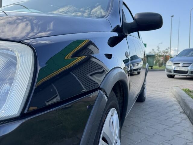 Черный Опель Корса, объемом двигателя 1 л и пробегом 140 тыс. км за 2300 $, фото 3 на Automoto.ua