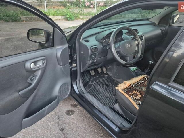 Чорний Опель Корса, об'ємом двигуна 1 л та пробігом 243 тис. км за 2900 $, фото 1 на Automoto.ua