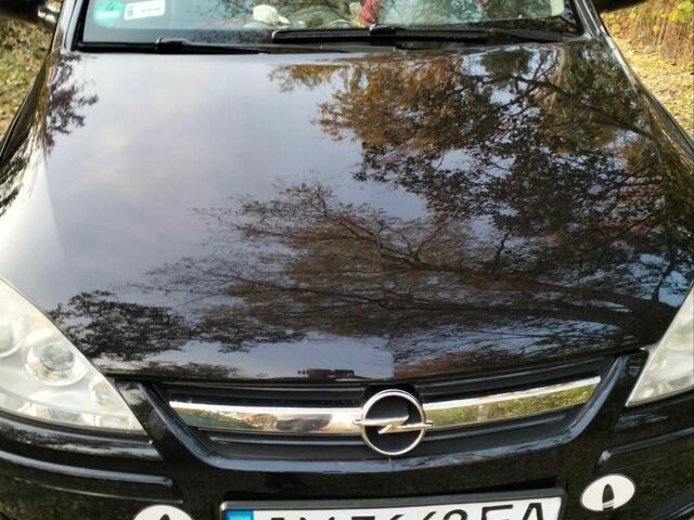 Черный Опель Корса, объемом двигателя 1.2 л и пробегом 220 тыс. км за 3600 $, фото 2 на Automoto.ua