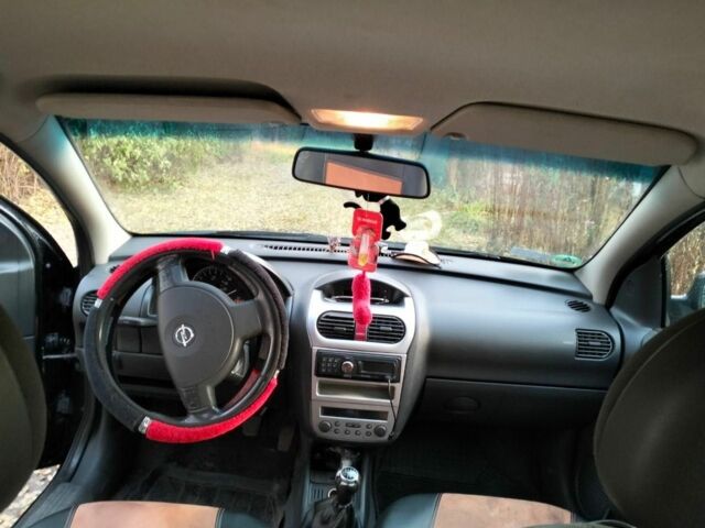 Черный Опель Корса, объемом двигателя 1.2 л и пробегом 220 тыс. км за 3600 $, фото 9 на Automoto.ua