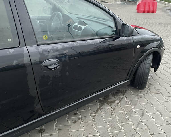 Чорний Опель Корса, об'ємом двигуна 1.2 л та пробігом 240 тис. км за 2800 $, фото 4 на Automoto.ua