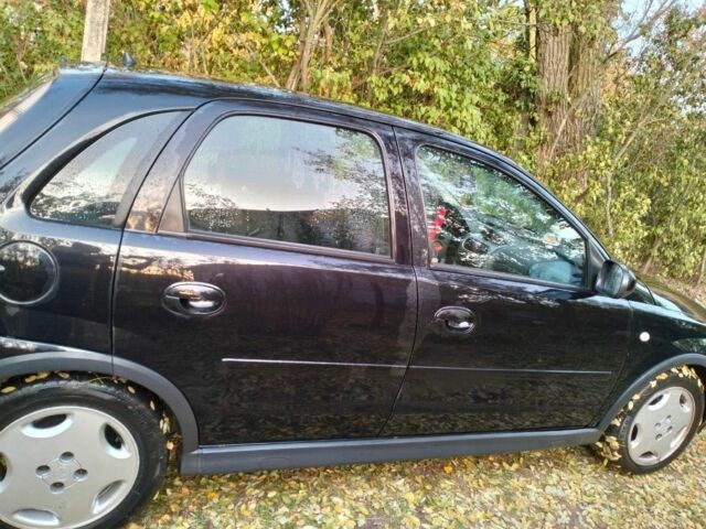 Черный Опель Корса, объемом двигателя 1.2 л и пробегом 220 тыс. км за 3600 $, фото 5 на Automoto.ua