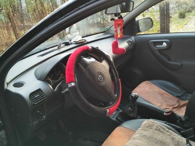 Черный Опель Корса, объемом двигателя 1.2 л и пробегом 220 тыс. км за 3600 $, фото 8 на Automoto.ua