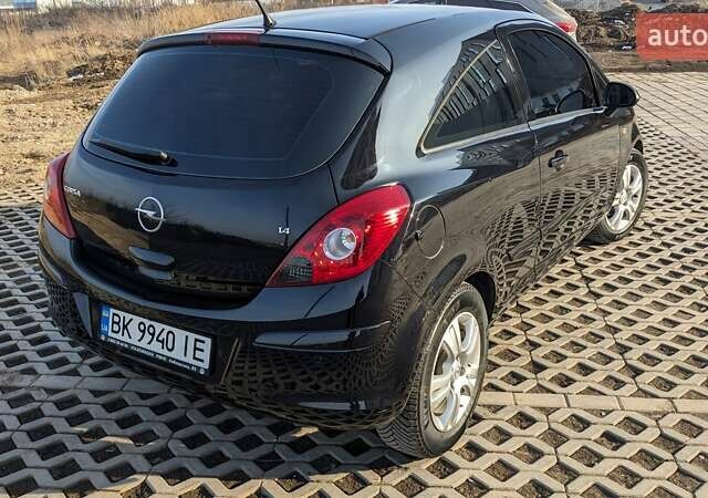 Черный Опель Корса, объемом двигателя 1.4 л и пробегом 253 тыс. км за 5599 $, фото 27 на Automoto.ua